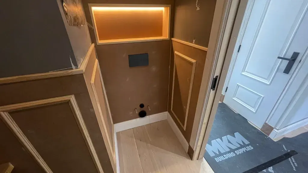 Fitted bespoke panelling detail with the vanity and basin in place