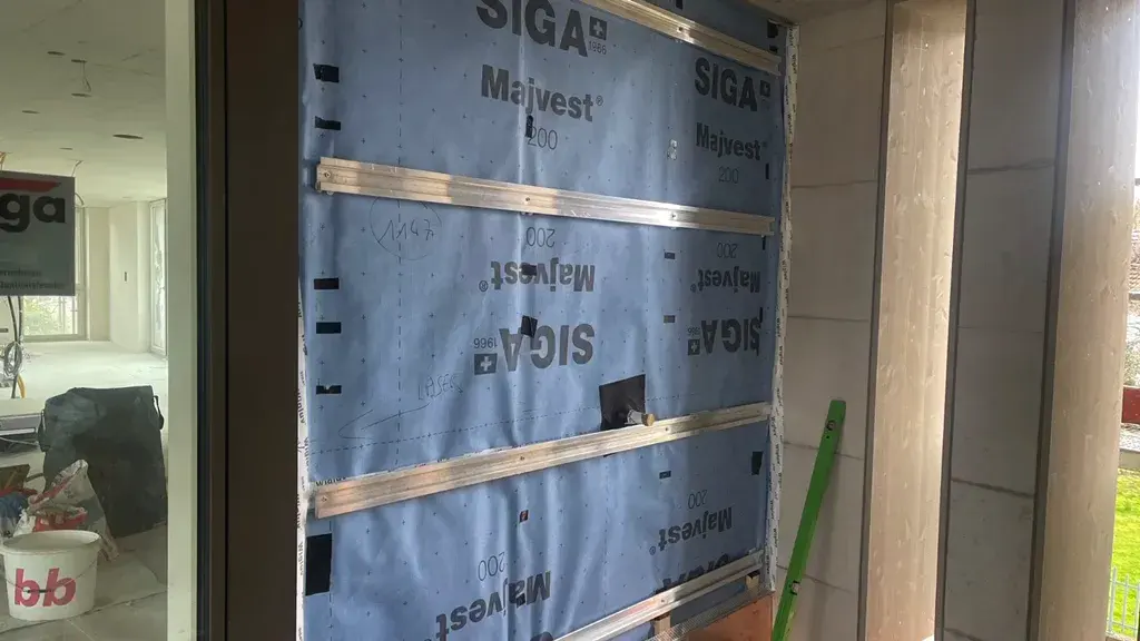 Window openings aligned across the full elevation